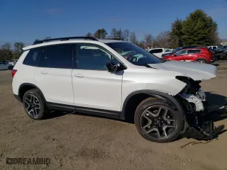 2023 Honda Passport Elite with VIN 5FNYF8H09PB037418, listed as a Copart auction lot 42770504 with 3,852 mi miles. Bid and sale history available at carsss.com. Image 4.