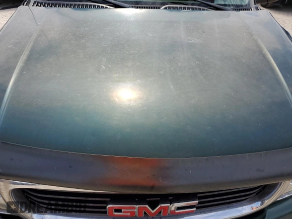 2002 GMC Yukon SLE z VIN 1GKEC13Z22R152796, wystawiony jako Copart lot #55330344 z przebiegiem 337 318 mil mil oraz Szkoda całkowita • Salvage title. Historia ofert i sprzedaży dostępna na DreamBid. Obrazek 12.