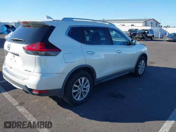 2018 Nissan Rogue SV with VIN KNMAT2MV8JP561410, listed as a IAAI auction lot 41691135 with 76,922 mi miles. Bid and sale history available at carsss.com. Image 4.