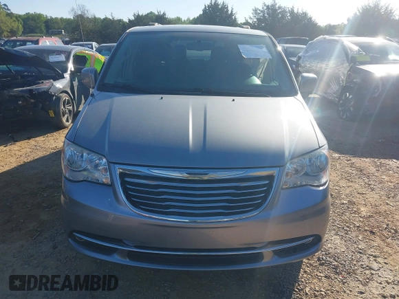 2015 Chrysler Town & Country Touring with VIN 2C4RC1BG9FR715307, listed as a IAAI auction lot 41988281 with 164,167 mi miles. Bid and sale history available at carsss.com. Image 12.