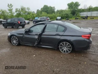 2020 BMW 5 Series M550i xDrive with VIN WBAJS7C06LCD12779, listed as a Copart auction lot 61136215 with 81,286 mi miles and Salvage title. Bid and sale history available at DreamBid. Image 2.
