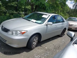 2003 Toyota Camry LE with VIN 4T1BE32K73U157902, listed as a IAAI auction lot 42248544 with 106,675 mi miles and . Bid and sale history available at DreamBid. Image 2.