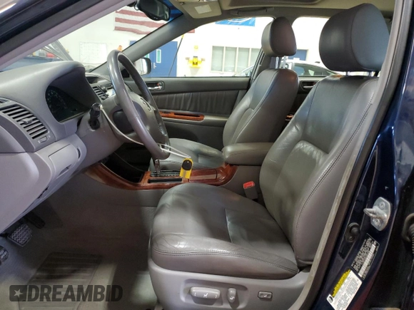 2004 Toyota Camry LE with VIN 4T1BF32K64U072368, listed as a Copart auction lot 51821965 with 136,646 mi miles and Salvage Title. Bid and sale history available at DreamBid. Image 7.