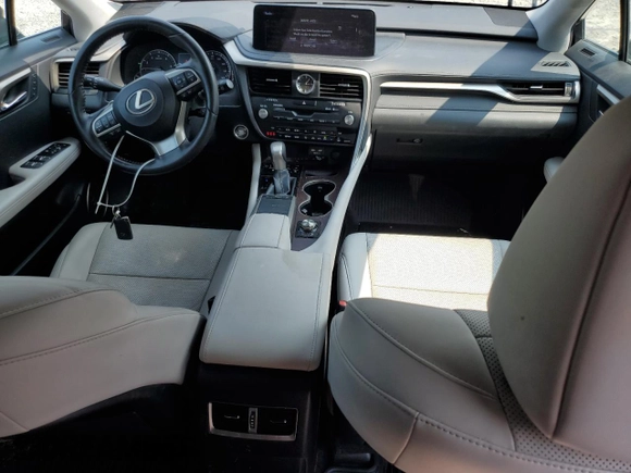 2020 Lexus RX 350 with VIN 2T2HZMDA5LC228570, listed as a Copart auction lot 60643225 with 134,118 mi miles and Salvage title. Bid and sale history available at DreamBid. Image 8.