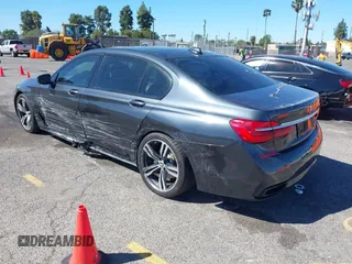 2016 BMW 7 Series 740i with VIN WBA7E2C52GG548048, listed as a IAAI auction lot 41701806 with 72,680 mi miles. Bid and sale history available at carsss.com. Image 3.