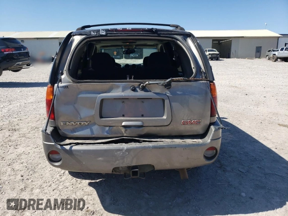 2005 GMC Envoy SLE с VIN 1GKDS13S852264341, выставлен на аукционе Copart как лот 49835015 с пробегом 178 401 миль миль и Списание • Salvage title. История ставок и продаж доступна на DreamBid. Изображение 6.