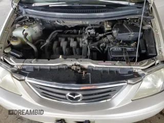 2000 Mazda MPV DX with VIN JM3LW28G8Y0142883, listed as a Copart auction lot 82633154 with 161,196 mi miles and Salvage title. Bid and sale history available at DreamBid. Image 12.