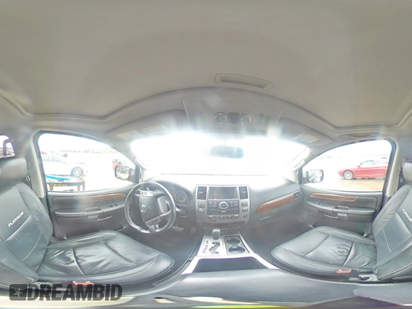 2014 Nissan Armada Platinum z VIN 5N1BA0NF5EN601168, wystawiony jako Copart lot #44590395 z przebiegiem Nie podano mil oraz Szkoda całkowita • Salvage title. Historia ofert i sprzedaży dostępna na DreamBid. Obrazek 16.