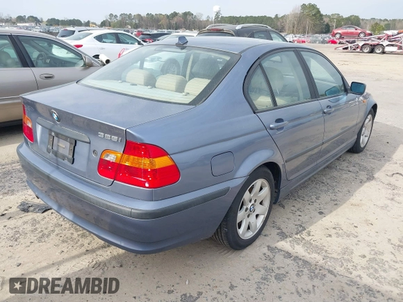 2005 BMW 3 Series 325i with VIN WBAET37445NJ85538, listed as a IAAI auction lot 41872686 with 121,237 mi miles. Bid and sale history available at carsss.com. Image 4.