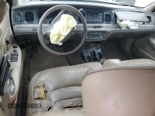 2000 Ford Crown Victoria LX z VIN 2FAFP74W4YX120352, wystawiony jako Copart lot #79833264 z przebiegiem Nie podano mil oraz Szkoda całkowita • Salvage title. Historia ofert i sprzedaży dostępna na DreamBid. Obrazek 8.