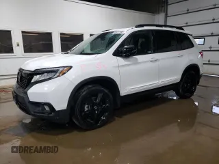 2021 Honda Passport Elite with VIN 5FNYF8H00MB000298, listed as a Copart auction lot 59617995 with 48,033 mi miles and Salvage title. Bid and sale history available at DreamBid. Image 1.