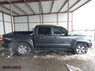 2013 Toyota Tacoma PreRunner with VIN 3TMJU4GN6DM153390, listed as a IAAI auction lot 41300619 with 163,974 mi miles. Bid and sale history available at carsss.com. Image 13.