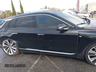 2024 Cadillac LYRIQ Luxury z VIN 1GYKPSRL6RZ120031, wystawiony jako IAAI lot #41579356 z przebiegiem 20 921 mil mil oraz . Historia ofert i sprzedaży dostępna na DreamBid. Obrazek 14.