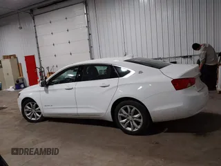 2018 Chevrolet Impala LT with VIN 1G1105S39JU135781, listed as a IAAI auction lot 41813394 with 100,747 mi miles and . Bid and sale history available at DreamBid. Image 14.