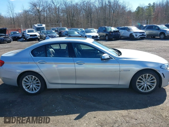 2014 BMW 5 Series 528i xDrive with VIN WBA5A7C58ED617131, listed as a IAAI auction lot 41749651 with 117,954 mi miles and . Bid and sale history available at DreamBid. Image 13.