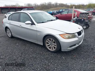 2007 BMW 3 Series 328i with VIN WBAVA33557PG53078, listed as a IAAI auction lot 41936187 with 186,492 mi miles. Bid and sale history available at carsss.com. Image 1.