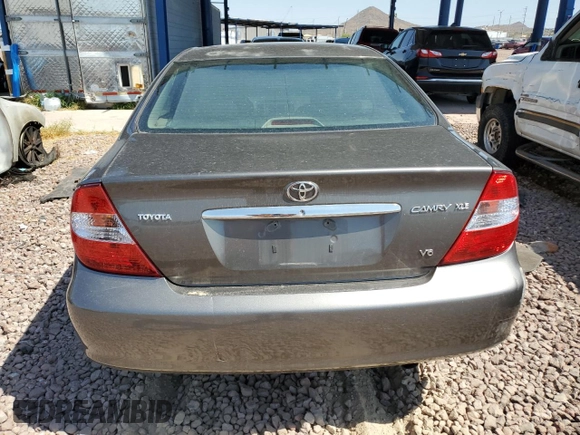2004 Toyota Camry LE with VIN 4T1BF30K24U569209, listed as a Copart auction lot 66181644 with 186,412 mi miles and Salvage Title. Bid and sale history available at carsss.com. Image 6.