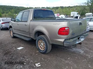 2003 Ford F-150 XLT with VIN 1FTRW08L63KD06455, listed as a IAAI auction lot 41988549 with 138,168 mi miles. Bid and sale history available at carsss.com. Image 3.
