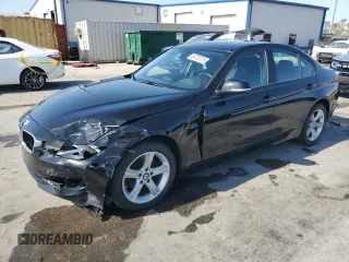2015 BMW 3 Series 328i with VIN WBA3A5C57FP605385, listed as a Copart auction lot 54703705 with 129,294 mi miles and Salvage title. Bid and sale history available at DreamBid. Image 1.