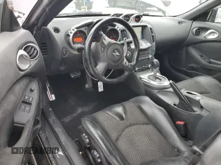 2014 Nissan 370Z Touring with VIN JN1AZ4FH1EM620177, listed as a Copart auction lot 42581255 with 106,957 mi miles and Salvage Title. Bid and sale history available at DreamBid. Image 8.