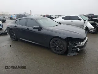 2022 BMW 8 Series M850i with VIN WBAGV8C0XNCH63529, listed as a Copart auction lot 86139494 with 78,710 mi miles and Salvage title. Bid and sale history available at DreamBid. Image 4.