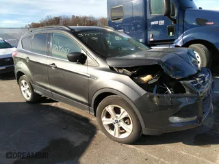 2016 Ford Escape SE with VIN 1FMCU9G99GUA33121, listed as a IAAI auction lot 37495107 with NaN miles. Bid and sale history available at carsss.com. Image 1.