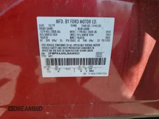 2020 Ford Edge SEL z VIN 2FMPK4J95LBA06923, wystawiony jako Copart lot #55591245 z przebiegiem 70 889 mil mil oraz Szkoda całkowita • Salvage title. Historia ofert i sprzedaży dostępna na DreamBid. Obrazek 13.