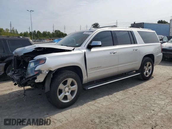 2020 Chevrolet Suburban Premier z VIN 1GNSKJKC0LR164243, wystawiony jako Copart lot #70530624 z przebiegiem Nie podano mil oraz Szkoda całkowita • Salvage title. Historia ofert i sprzedaży dostępna na DreamBid. Obrazek 1.