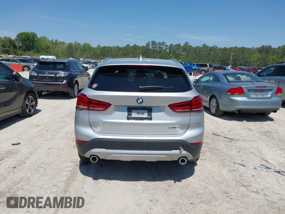 2021 BMW X1 sDrive28i with VIN WBXJG7C06M5T14235, listed as a IAAI auction lot 42021762 with 53,384 mi miles and . Bid and sale history available at DreamBid. Image 16.