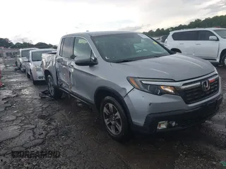 2017 Honda Ridgeline RTL with VIN 5FPYK3F52HB018912, listed as a IAAI auction lot 42464557 with 83,576 mi miles and . Bid and sale history available at DreamBid. Image 1.