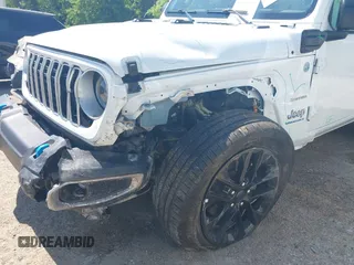 2024 Jeep Wrangler Sahara with VIN 1C4RJXP60RW292413, listed as a IAAI auction lot 42053663 with 22,808 mi miles and . Bid and sale history available at DreamBid. Image 6.