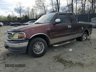 2001 Ford F-150 XL with VIN 1FTZX17211NA94099, listed as a Copart auction lot 50587055 with Not provided miles and Salvage title. Bid and sale history available at DreamBid. Image 1.