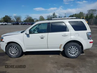 2010 Mercury Mariner Premier with VIN 4M2CN9H7XAKJ26886, listed as a IAAI auction lot 42027825 with 149,561 mi miles and . Bid and sale history available at DreamBid. Image 14.