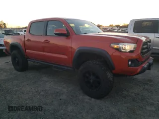 2017 Toyota Tacoma SR5 with VIN 3TMCZ5AN4HM086321, listed as a Copart auction lot 87658645 with 94,695 mi miles and Salvage Title. Bid and sale history available at carsss.com. Image 4.