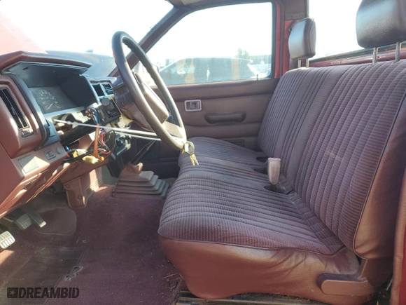 1993 Nissan Trucks 2WD with VIN 1N6SD11S2PC345264, listed as a Copart auction lot 83001414 with 53,623 mi miles and Salvage Title. Bid and sale history available at carsss.com. Image 7.