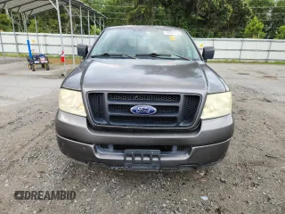2005 Ford F-150 STX with VIN 1FTRX12W55FB32573, listed as a Copart auction lot 59602715 with 238,701 mi miles and Salvage title. Bid and sale history available at DreamBid. Image 5.