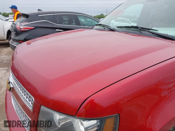 2012 Chevrolet Suburban LT z VIN 1GNSCJE01CR206854, wystawiony jako IAAI lot #41951549 z przebiegiem 172 546 mil mil oraz . Historia ofert i sprzedaży dostępna na DreamBid. Obrazek 6.