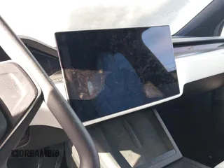 2022 Tesla Model X Plaid z VIN 7SAXCBE69NF343318, wystawiony jako IAAI lot #41387403 z przebiegiem Nie podano mil oraz . Historia ofert i sprzedaży dostępna na DreamBid. Obrazek 15.