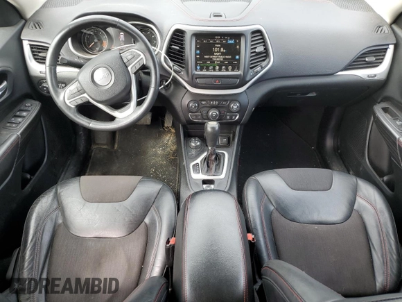 2015 Jeep Cherokee Trailhawk with VIN 1C4PJMBSXFW545534, listed as a Copart auction lot 62236885 with 148,448 mi miles and Clean title. Bid and sale history available at DreamBid. Image 8.
