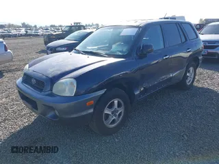 2004 Hyundai Santa Fe GLS with VIN KM8SC73E84U838268, listed as a IAAI auction lot 42030257 with 160,487 mi miles. Bid and sale history available at carsss.com. Image 2.