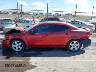 2008 Dodge Avenger SXT with VIN 1B3LC56R98N169618, listed as a IAAI auction lot 40626545 with 153,921 mi miles. Bid and sale history available at carsss.com. Image 14.