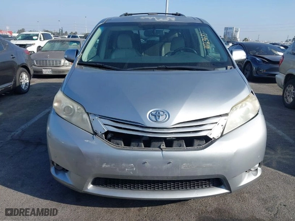 2013 Toyota Sienna XLE AAS with VIN 5TDYK3DC0DS360388, listed as a IAAI auction lot 41163681 with 146,920 mi miles. Bid and sale history available at carsss.com. Image 13.