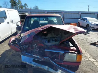 1997 Ford Ranger XLT with VIN 1FTCR10A5VTA45443, listed as a IAAI auction lot 41696416 with 323,855 mi miles. Bid and sale history available at carsss.com. Image 11.