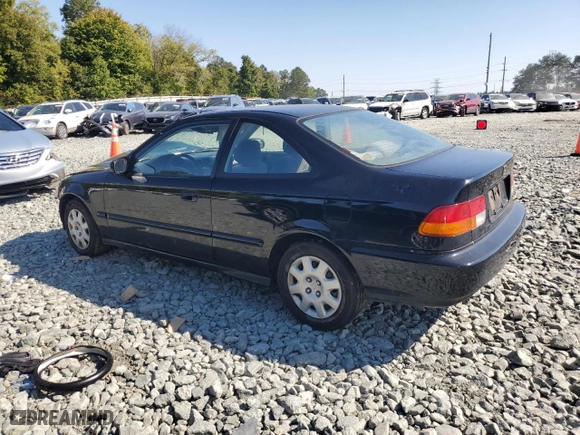 1997 Honda Civic DX with VIN 1HGEJ6228VL123265, listed as a Copart auction lot 74078684 with 49,904 mi miles and Salvage Title. Bid and sale history available at carsss.com. Image 2.