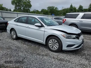 2019 Volkswagen Jetta S with VIN 3VWN57BU4KM007384, listed as a Copart auction lot 61614705 with 100,127 mi miles and Salvage title. Bid and sale history available at DreamBid. Image 4.