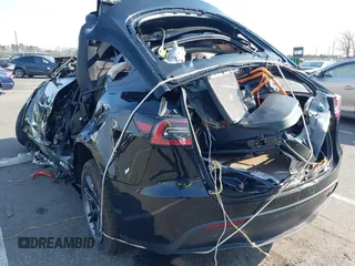 2024 Tesla Model Y Long Range with VIN 7SAYGDEE4RF149894, listed as a IAAI auction lot 41771185 with Not Provided miles and . Bid and sale history available at DreamBid. Image 3.