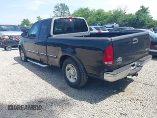 1998 Ford F-150 with VIN 1FTZX1762WNB88647, listed as a IAAI auction lot 42682271 with 187,520 mi miles and . Bid and sale history available at DreamBid. Image 3.