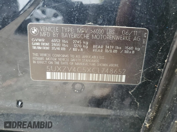 2012 BMW X5 35i z VIN 5UXZV4C5XCL748652, wystawiony jako Copart lot #55457455 z przebiegiem 149 030 mil mil oraz Szkoda całkowita • Salvage title. Historia ofert i sprzedaży dostępna na DreamBid. Obrazek 13.