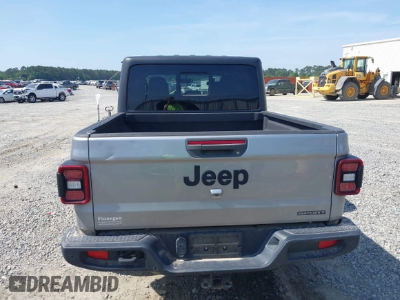 2020 Jeep Gladiator Sport S with VIN 1C6HJTAG7LL128940, listed as a IAAI auction lot 42108154 with 90,596 mi miles and . Bid and sale history available at DreamBid. Image 16.