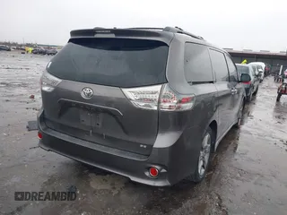 2014 Toyota Sienna SE with VIN 5TDXK3DC4ES434604, listed as a IAAI auction lot 41346434 with 108,633 mi miles and . Bid and sale history available at DreamBid. Image 4.